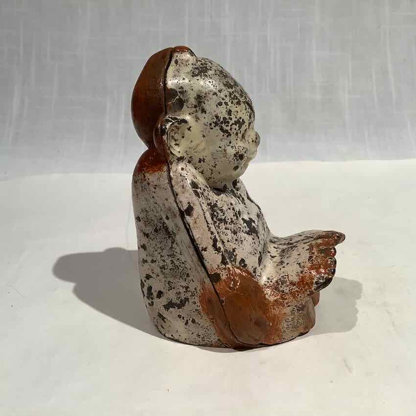 Curly Toed Billiken Iron Still Bank