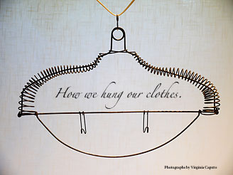 Portrait of old clothiing hanger by Virginia Caputo